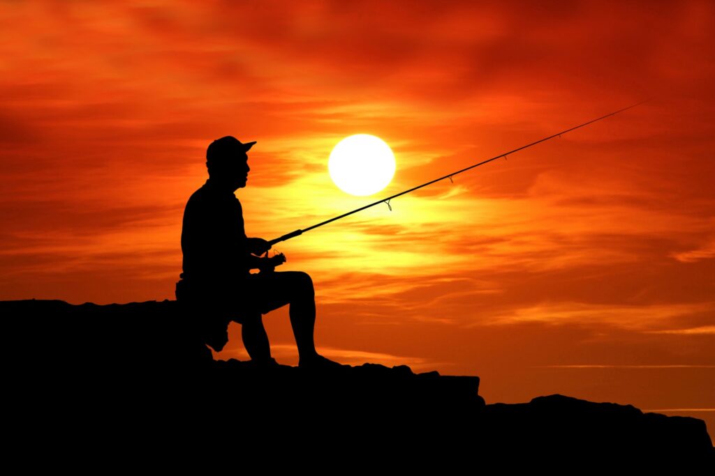 Man fishing on the rocks